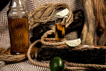 Elite tequila in a pile with lime