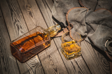 Glass and bottle of bourbon whiskey