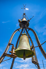 Orvieto, Italy - Historic bell on top of the Torre del Moro tower in Orvieto old town quarter