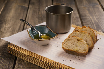 Lime honey with bread on a cutting board