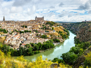 Panoramic view of the historic city of Toledo with river Tajo, Spain.