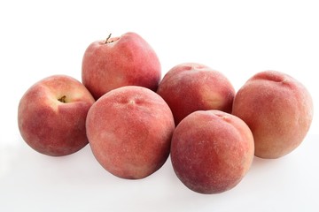 orange and red sweet peaches