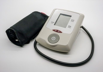 Automatic digital blood pressure monitor isolated on white