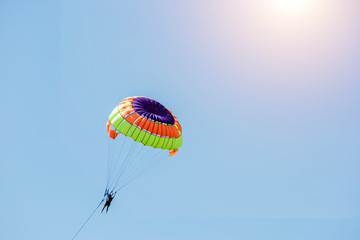 Man are playing Parasailing in Pattaya beach in summer.Having fun.Positive human emotions, feelings, joy. Spring holidays, summer vacation.