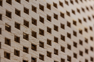 Wood background with grid square hole