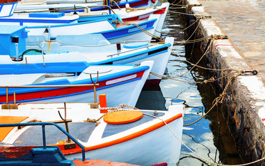 fishing boats morred in a harbor
