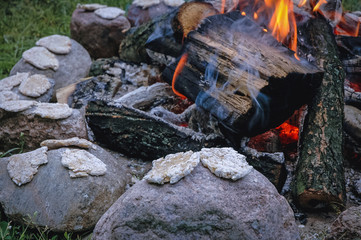 So called Podplomyki - Polish ancient simple kind of flat bread made with water and flour on heated stones
