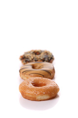 Chocolate strawberry and orange Donut isolated on white background