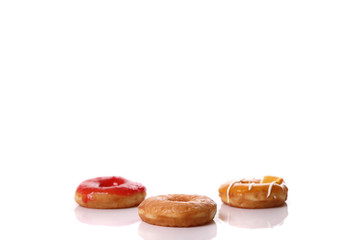 Chocolate strawberry and orange Donut isolated on white background