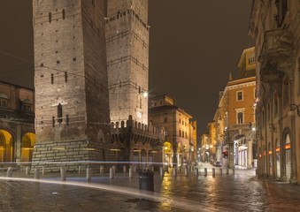 Bologna - The panorama of square Piazza della Mercanzia at night