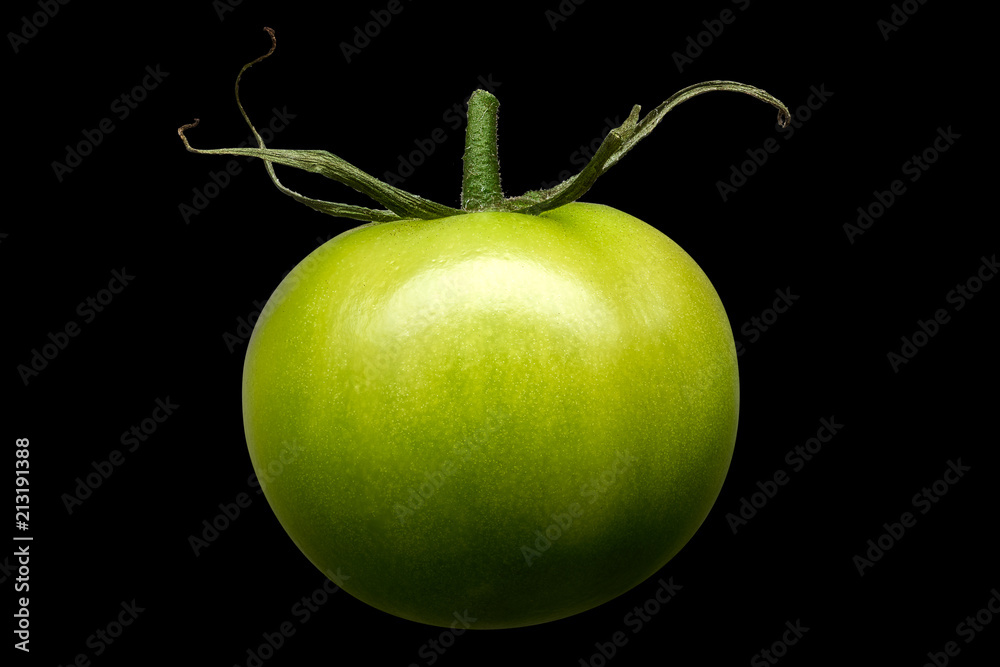 Wall mural delicious single green tomato isolated on black background with clipping path - Wall murals