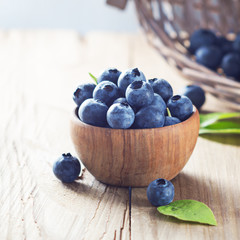 blueberries in wooden bowl