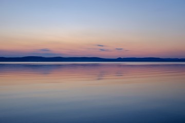 Fototapeta na wymiar soft and calm sunset at Balaton lake in summer
