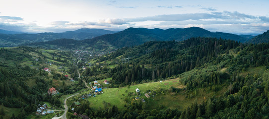 Aerial view to carpathian village Slavske with moutains