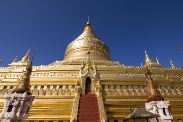 Fototapeta na wymiar Bagan, Myanmar, December 29, 2017: The Shwezigon Pagoda or Shwezigon Paya is a Buddhist temple located in Nyaung-U, a town near Bagan, in Myanmar