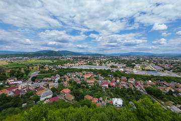 Gorodishka from one-story houses with red roofs from a bird's-eye view