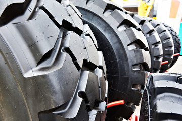 Tires of different sizes for tractors in store