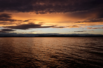 sunset over lake - golden color, Balaton, summer