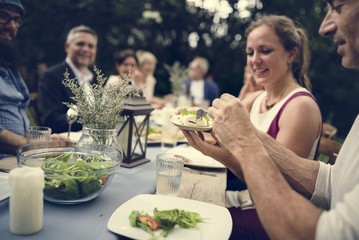 Group of diverse friends are having a dinner together