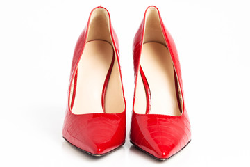 Red high heel shoes isolated on a white background. 