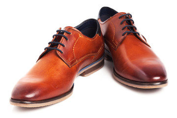 Brown Oxford shoes isolated on white background.
