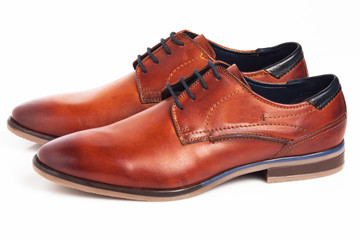 Brown Oxford shoes isolated on white background.