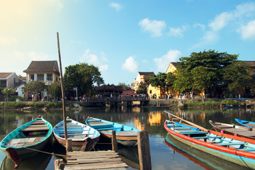 japanese bridge in ancient Hoi An with colorful boat