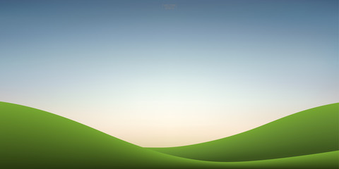 Obraz premium Green grass hill and sunset sky background. Outdoor natural background for template design. Vector.