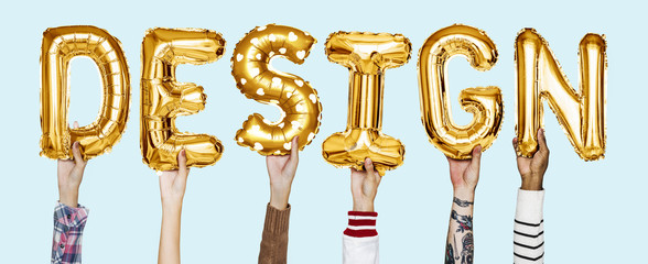 Yellow gold alphabet helium balloons forming the text design