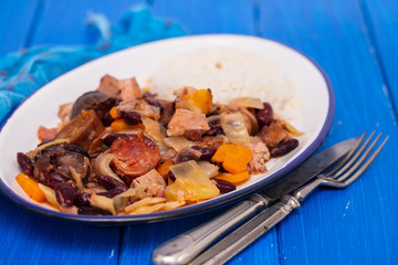 typical portuguese dish feijoada transmontana on white plate