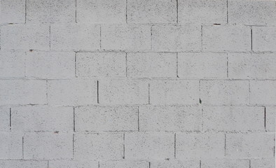 Grey painted concrete block wall texture background