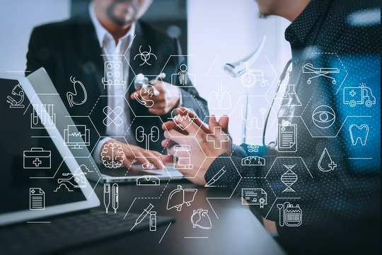 Medical and health care concept,Doctor meeting with his team in modern office at hospital