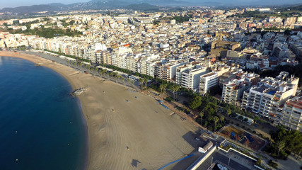 Fototapeta premium Aerial view of Mediterranean town, Blanes, Costa Brava, Spain