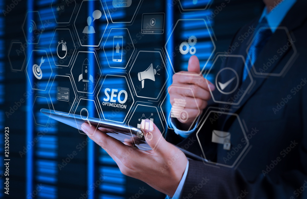 Poster businessman hand using tablet computer and server room