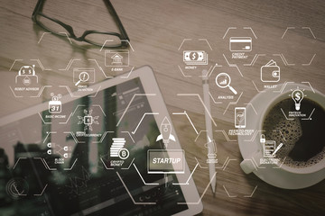 Coffee cup and Digital table dock smart keyboard,eyeglasses,stylus pen on wooden table,filter effect