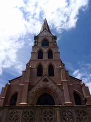 Fototapeta na wymiar Parish Church with clouds and nice sky