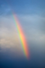 Part of the color rainbow on the cloudy sky