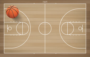 Obraz premium Basketball ball on basketball field background. Vector.