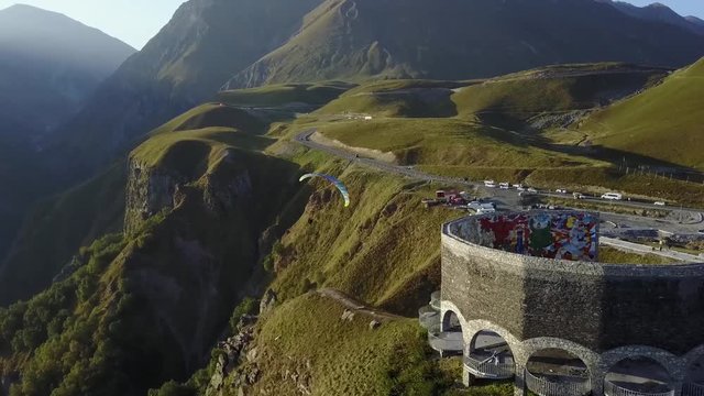Aerial view. Paragliding in the mountains. Kazbegi, Georgia