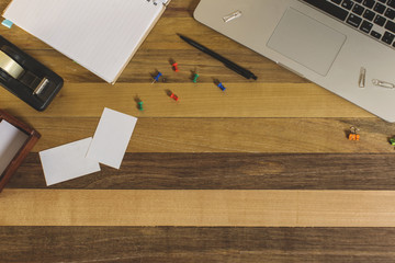 flat lay office desk workplace. laptop computer on wooden background.