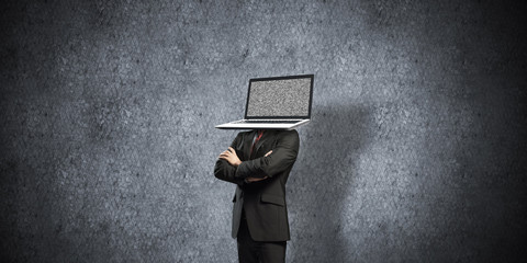Businessman with laptop instead of head.