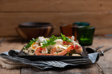 Close up of  Thai Local food, Spicy Green Eggplant Salad with Prawns