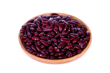 red beans in wooden plant isolated on white background