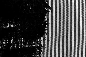 Grunge dirty Black and white closeup of stripped fabric texture