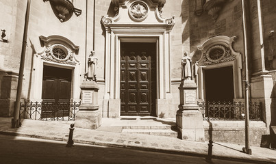 Entrance to Saint Dominic Church Valletta Malta, high contrast sepia tone summer 2018 Baroque architecture