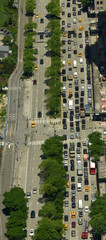 View from skyscrapers on the streets of New York City. Top view on the street with cars on the road
