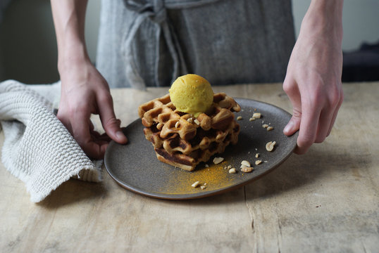 Waffles with banana and curry ice cream