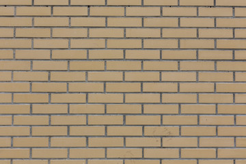 Obraz premium Yellow with grey seams stone bricks wall pattern texture background
