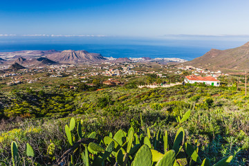 Aerial view on Costa Adeje, landscape with volcanic peaks.