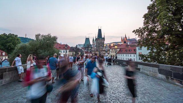 Hyperlapse time lapse sequence on charles bridge in Prague from day to night